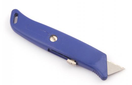 A utility knife is often used to remove silicone.