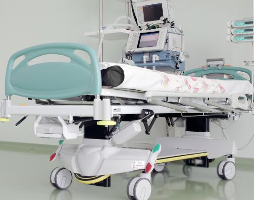 Overbed tables are more tailored for specific uses than standard hospital beds.