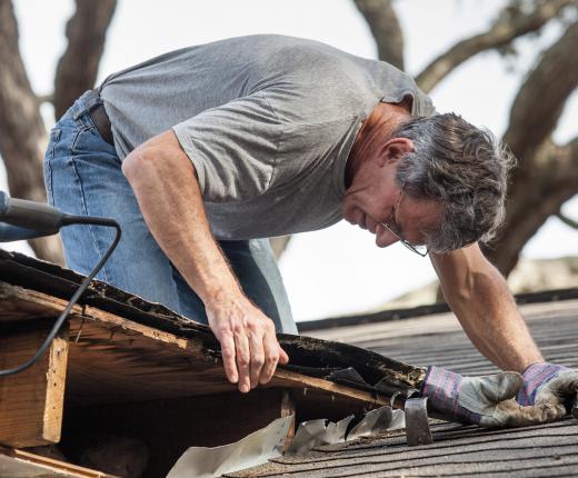 It may be necessary to tear up shingles to fix a sagging roof.