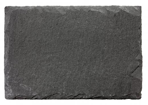 A slate tile for a fireplace hearth.