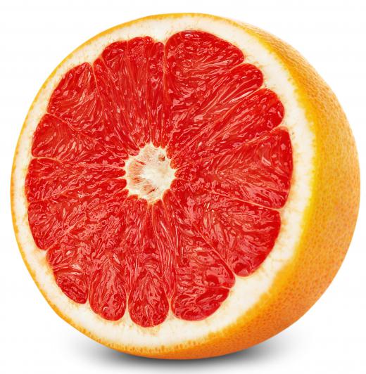 Grapefruit and other citrus fruits contain spongy white pith (albedo) that sits between the skin and the flesh.