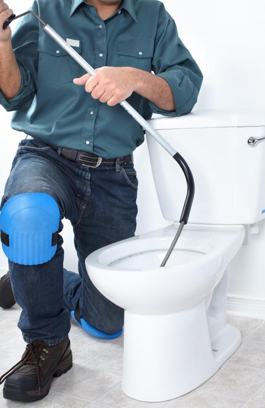 Stubborn toilet clogs might require a drain snake.