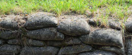 Sand shovels can be used to fill sandbags.