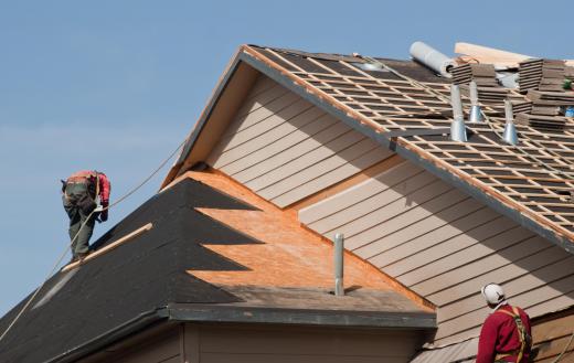 Pre-fabricated roof caps may be used when workers are installing roofing systems.