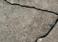 Paint can be used to cover up cracks on cement floors.